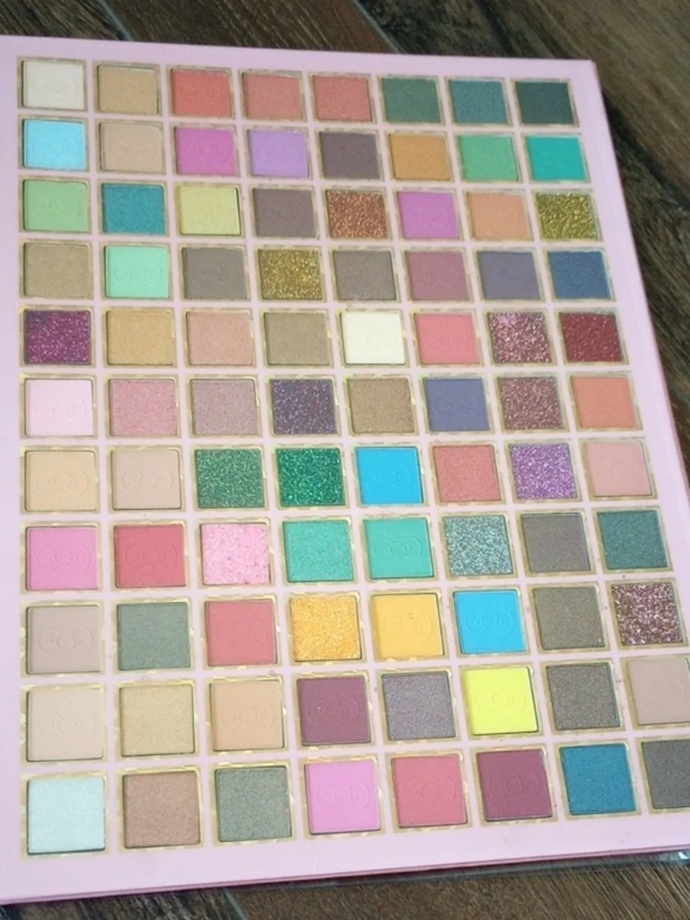 Hello Kitty themed eyeshadow palette with 88 different